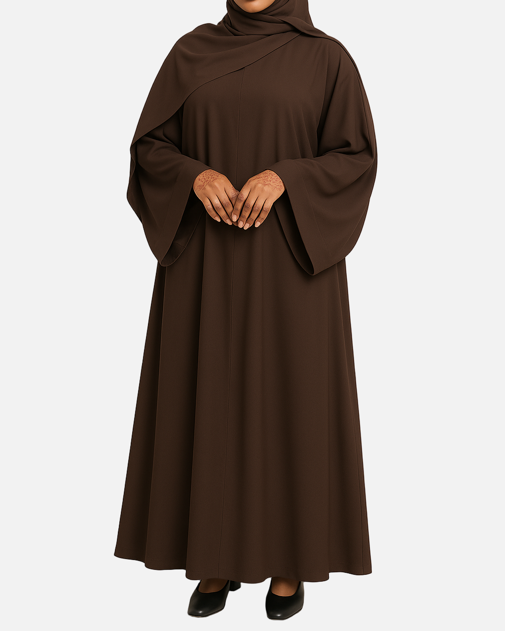 Woman wearing a brown abaya on a beige background